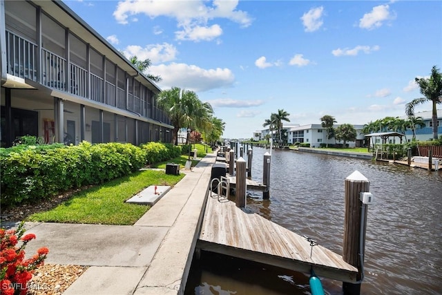 dock area with a water view