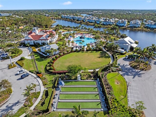 birds eye view of property featuring a water view