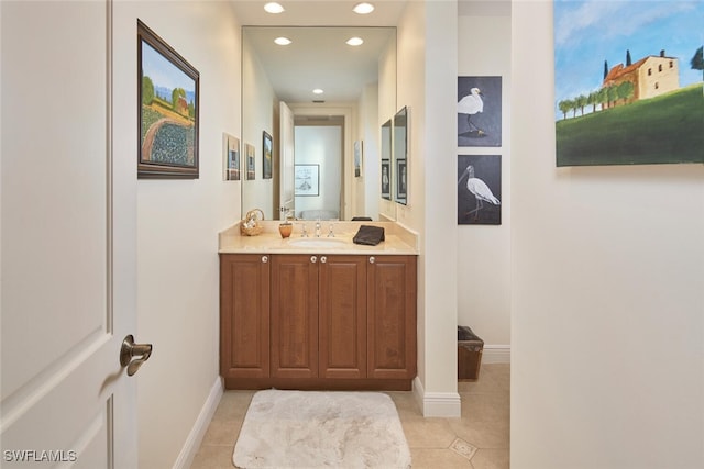 bathroom featuring tile patterned floors and vanity