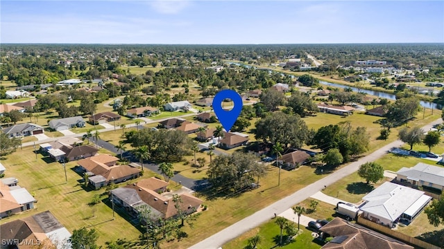 235 Thistle Ct, Lehigh Acres, FL 33936 - view of property location with nearby suburban area and a large body of water