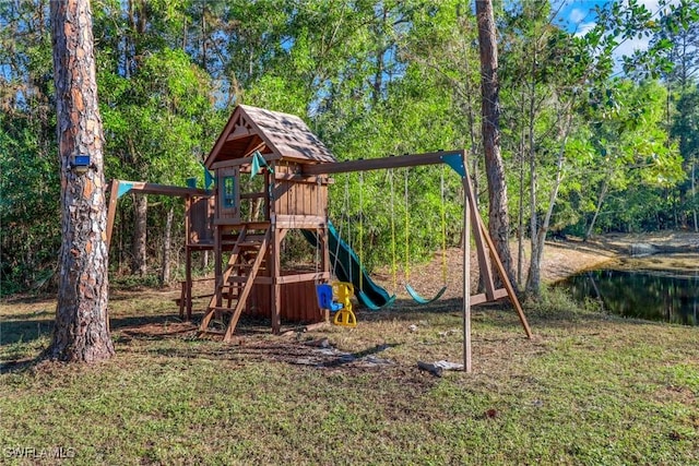 view of jungle gym with a water view