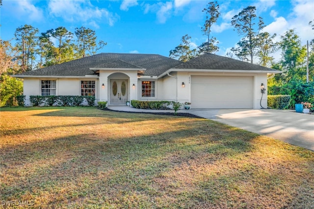 ranch-style house featuring a front lawn and a garage