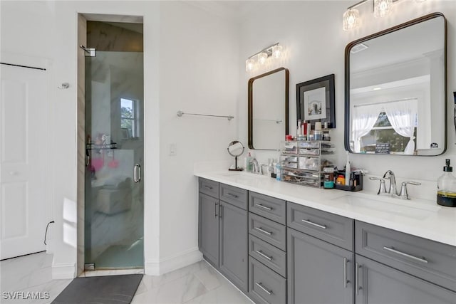 bathroom with vanity and an enclosed shower