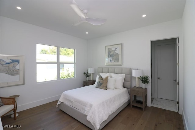 bedroom featuring recessed lighting, wood finished floors, a ceiling fan, and baseboards