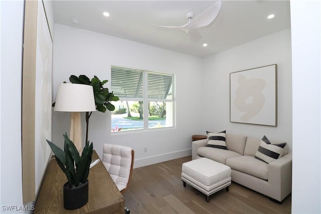 living area featuring ceiling fan, baseboards, wood finished floors, and recessed lighting