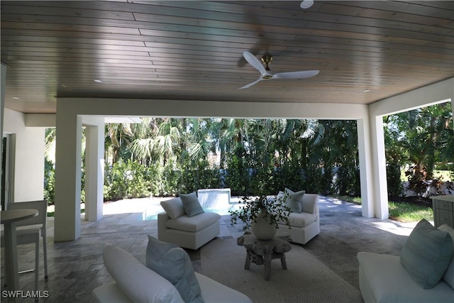 view of patio / terrace with a ceiling fan and outdoor lounge area