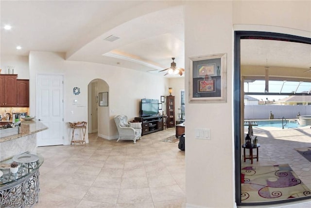 living room with ceiling fan