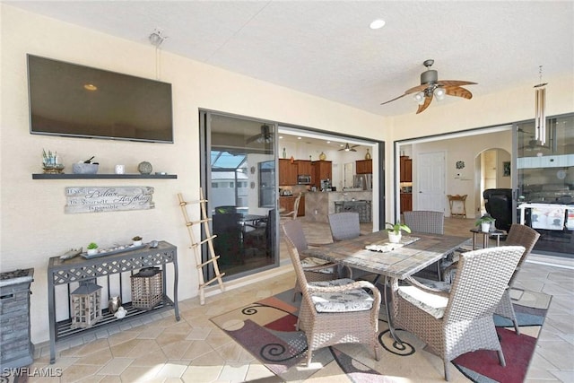 dining room featuring ceiling fan