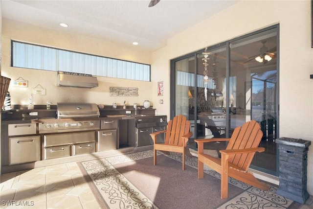 view of patio / terrace with an outdoor kitchen and a grill