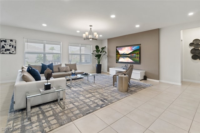 tiled living room featuring an inviting chandelier