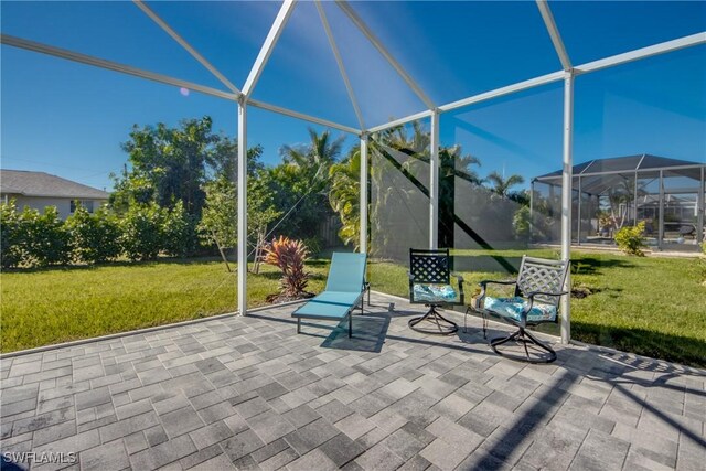 view of patio / terrace with glass enclosure