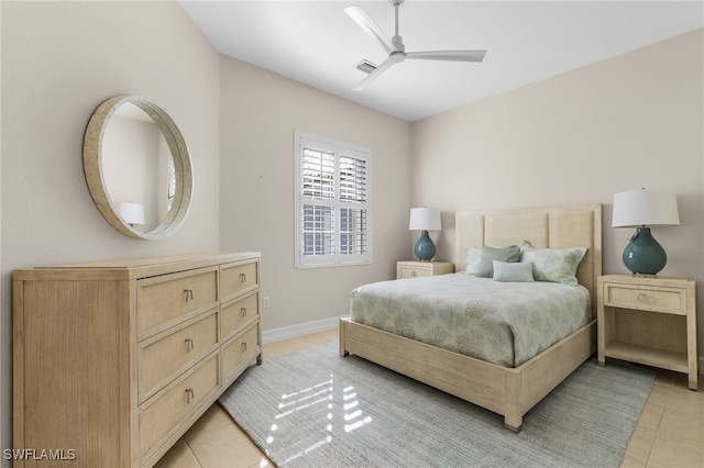 bedroom featuring ceiling fan and light tile patterned flooring