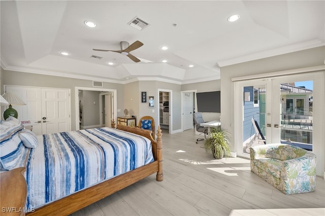 bedroom featuring access to exterior, ornamental molding, ceiling fan, light hardwood / wood-style flooring, and a closet