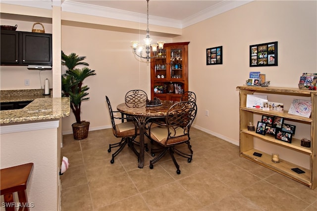 tiled dining area featuring crown molding and a notable chandelier