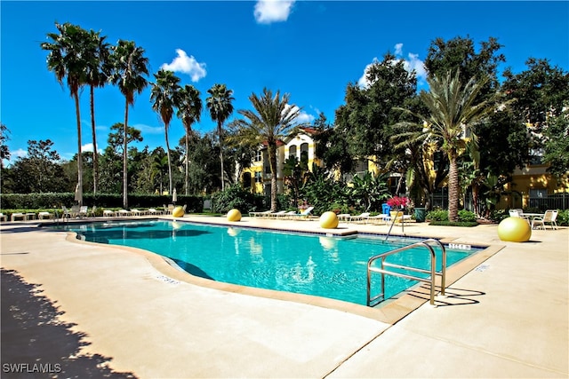 view of pool featuring a patio area