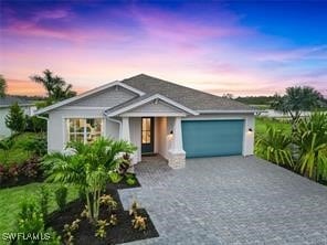 view of front of house with a garage