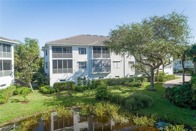 exterior space featuring a front lawn