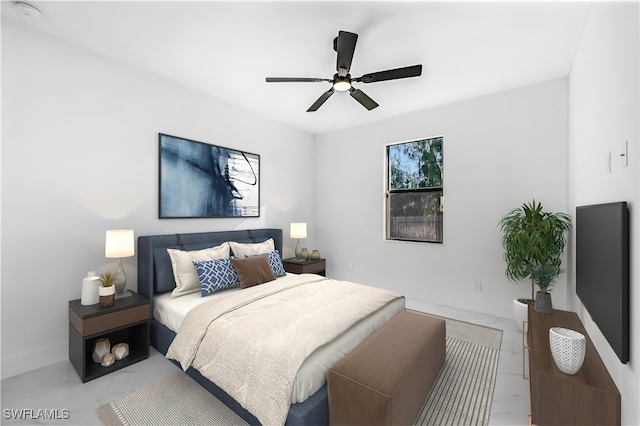 bedroom featuring ceiling fan