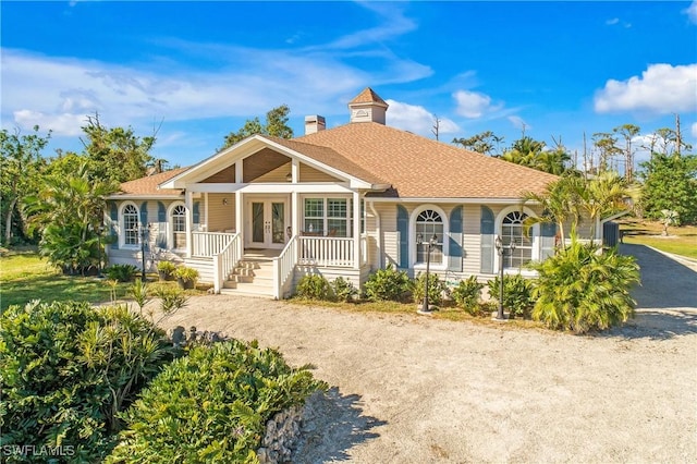 view of front facade featuring french doors