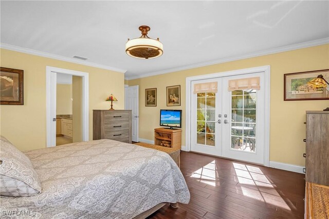 bedroom featuring ensuite bath, french doors, dark wood-type flooring, crown molding, and access to outside