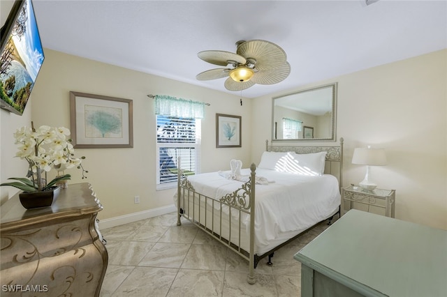 bedroom featuring ceiling fan