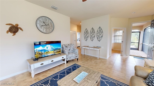 living room featuring light tile patterned floors