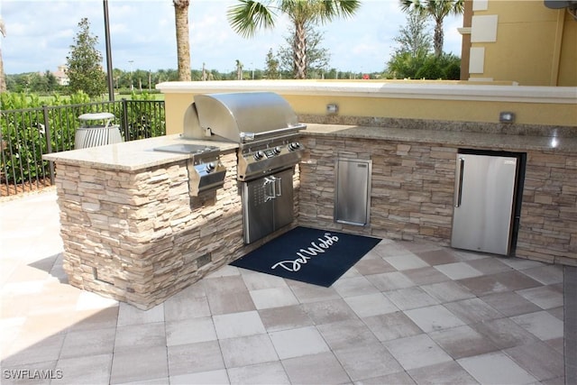 view of patio featuring area for grilling