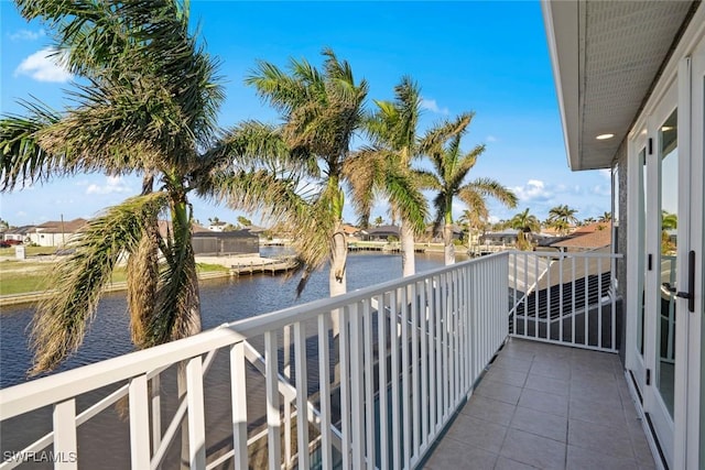 balcony featuring a water view