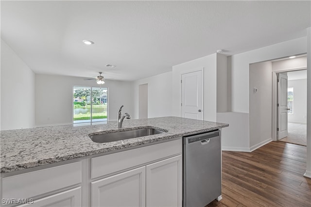 kitchen with dark hardwood / wood-style flooring, stainless steel dishwasher, ceiling fan, sink, and white cabinets