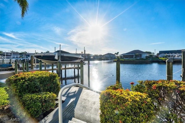 dock area featuring a water view