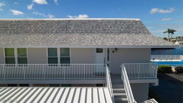 exterior space with a water view