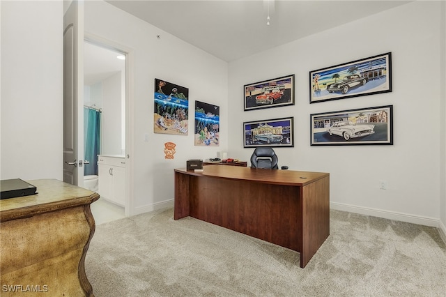 office space with light colored carpet