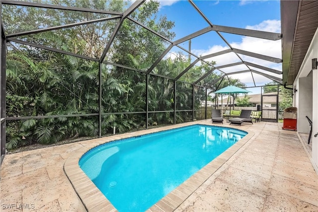 1140 Jeronimo Dr, Naples, FL 34103 - outdoor pool with a patio and a lanai