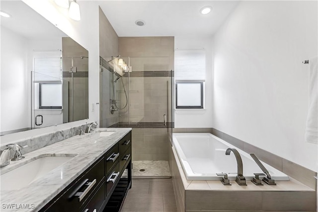 bathroom with vanity, tile patterned floors, and independent shower and bath