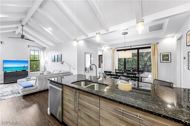 kitchen with dishwasher, sink, dark wood-type flooring, lofted ceiling with beams, and pendant lighting