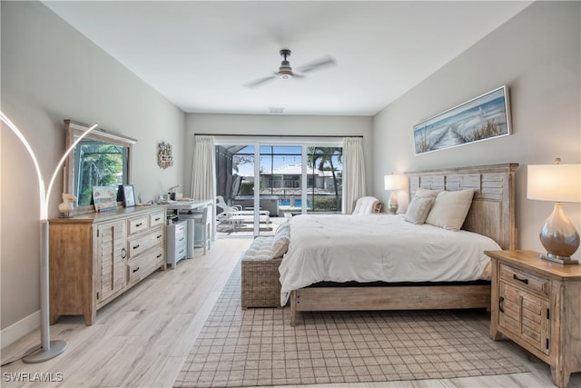 bedroom with access to outside, multiple windows, ceiling fan, and light wood-type flooring