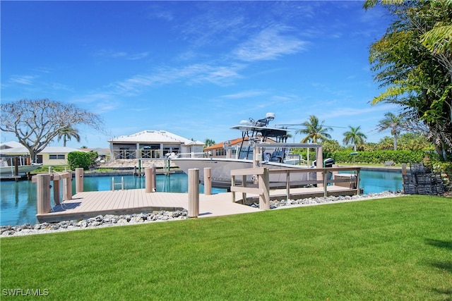 dock area featuring a yard and a water view