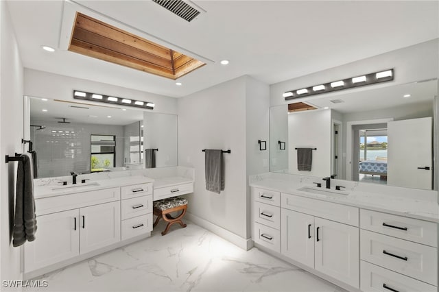 bathroom with vanity and walk in shower