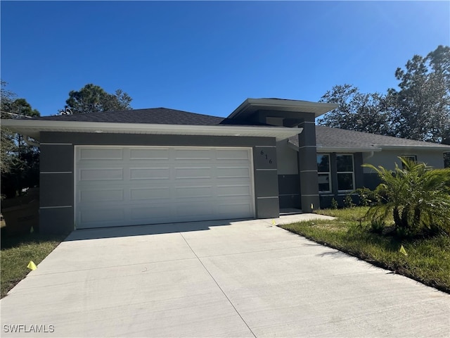 view of front of property featuring a garage