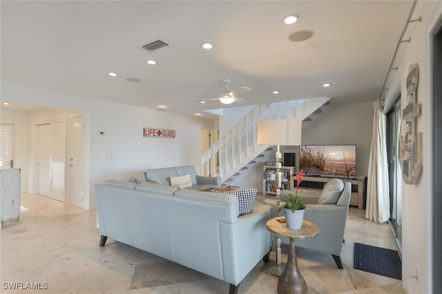 living room with ceiling fan