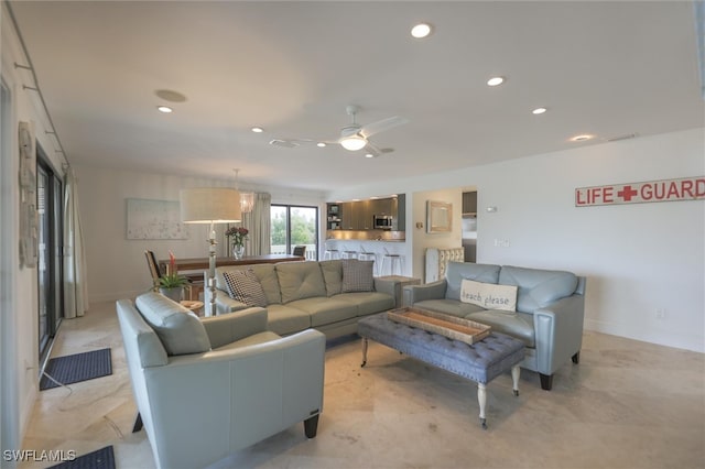 living room with ceiling fan