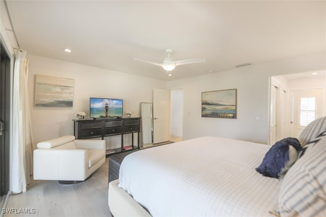 bedroom featuring ceiling fan and wood-type flooring