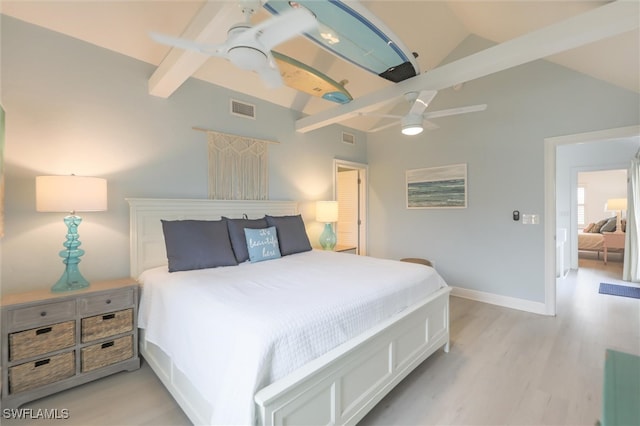 bedroom with ceiling fan, lofted ceiling with beams, and light hardwood / wood-style flooring