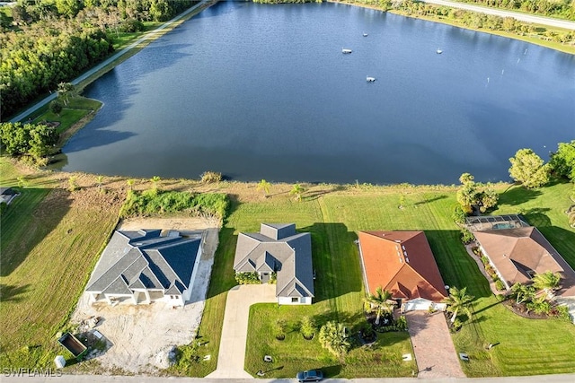 drone / aerial view with a water view