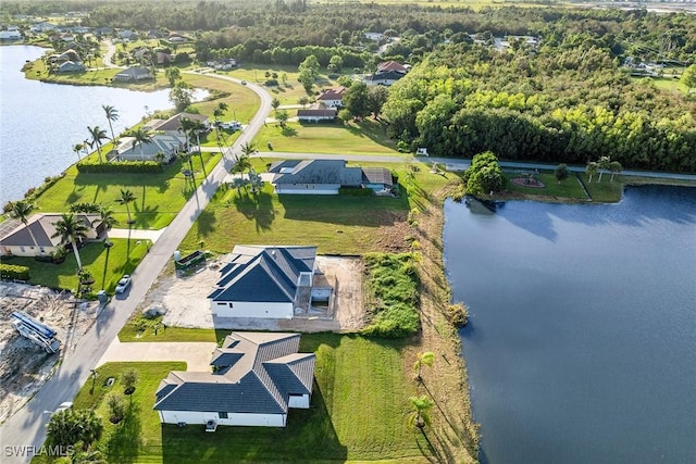 drone / aerial view with a water view