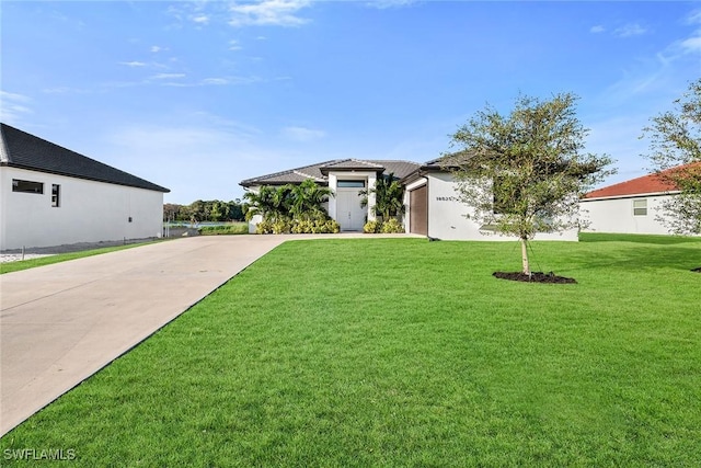 view of front of home featuring a front yard