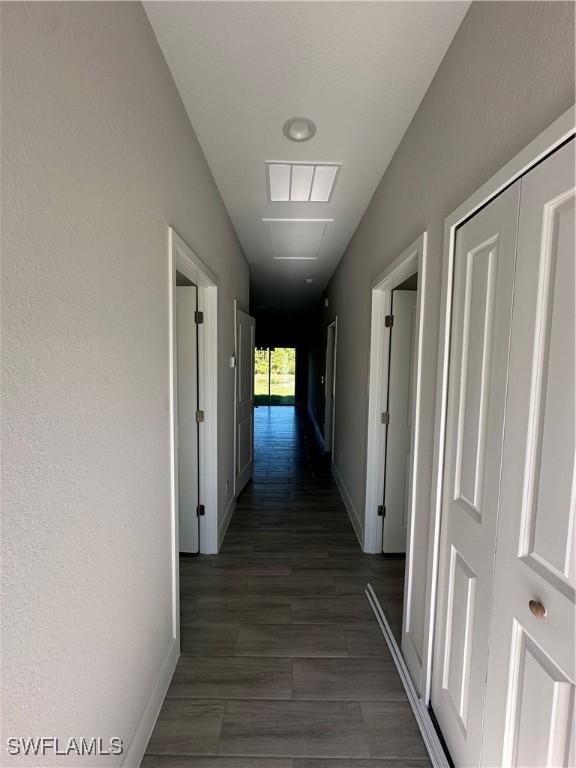 hall featuring dark hardwood / wood-style floors