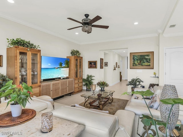 tiled living room with ceiling fan and ornamental molding