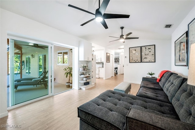 3671 8th Ave SE, Naples, FL 34117 - living area with a ceiling fan, light wood finished floors, and vaulted ceiling