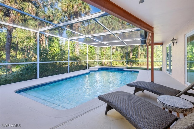 3671 8th Ave SE, Naples, FL 34117 - swimming pool featuring a patio and a lanai